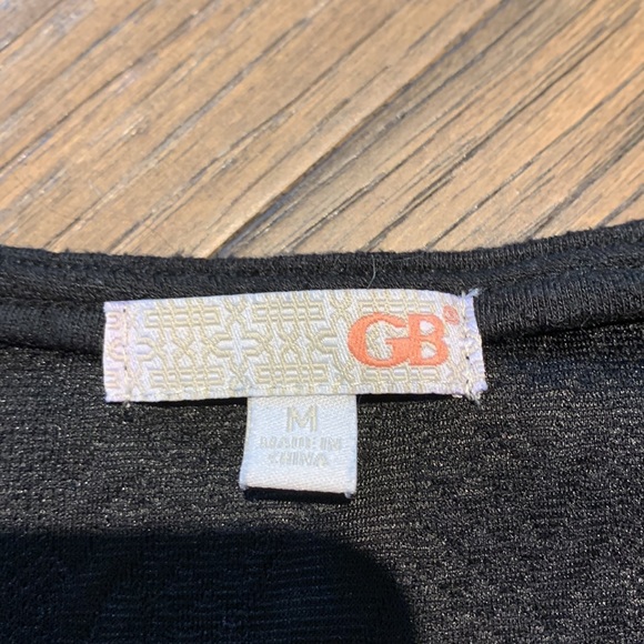 Super cute short sleeve medium black cotton top. - Picture 2 of 3